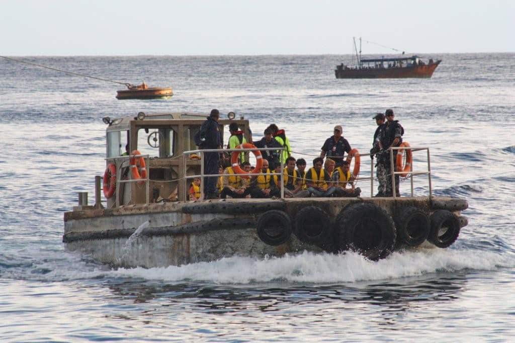 A boat carrying asylum seekers arrives at Christmas Island on in 2012.