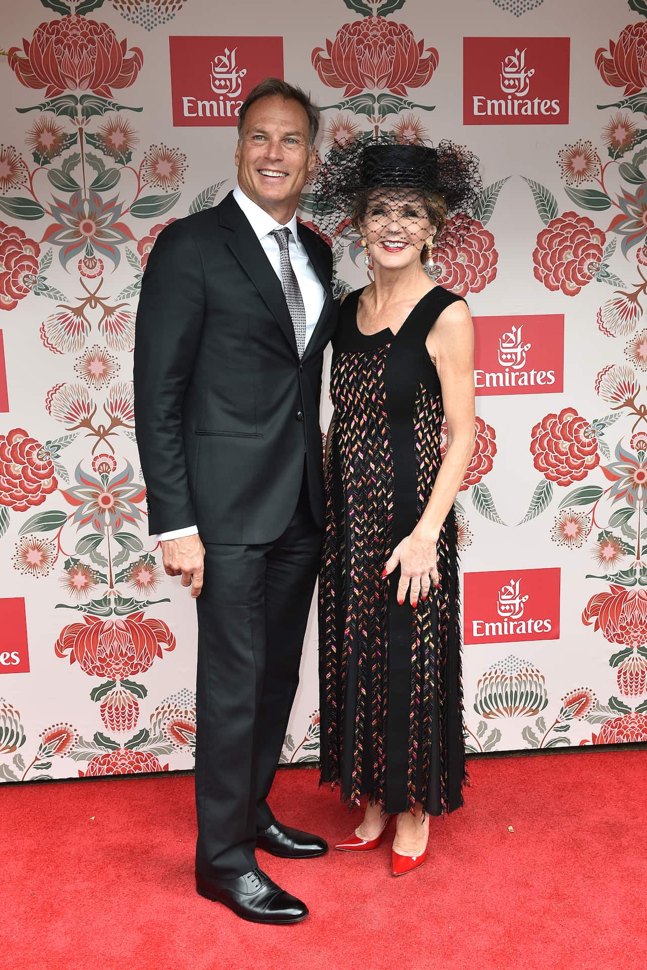 Australian Foreign Minister Julie Bishop and partner David Panton pose for a photograph at the Emirates marquee on Melbourne Cup Day at Flemington Racecourse in Melbourne, Tuesday. Nov. 1, 2016. (AAP Image/Julian Smith) NO ARCHIVING, EDITORIAL USE ONLY
