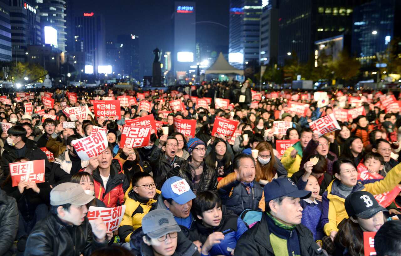 Hundreds of thousands of people rally in the streets of Seoul to demand the resignation of President Park Geun Hye.