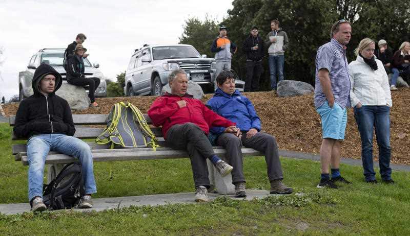 Stranded tourists gather at a park in Kaikoura following an earthquake in New Zealand