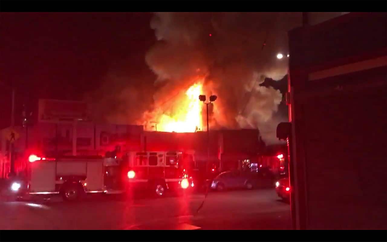 Handout frame grab released via Twitter user @Oaklandfirelive showing the scene of a warehouse fire in the Fruitavale district of Oakland 