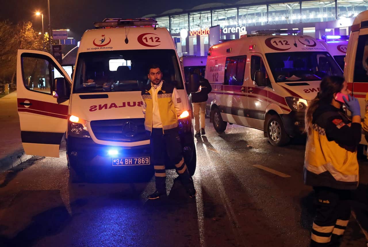 Ambulances are present at the scene after an explosion around Vodafone Arena Stadium in Istanbul, Turkey.