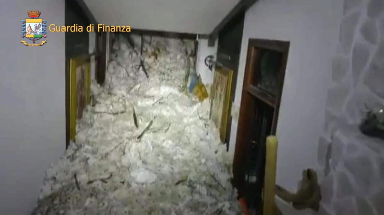 A handout photo made available by the Italian Guardia di Finanza showing snow fill up  the interior of the hotel Rigopiano in the town of Farindola