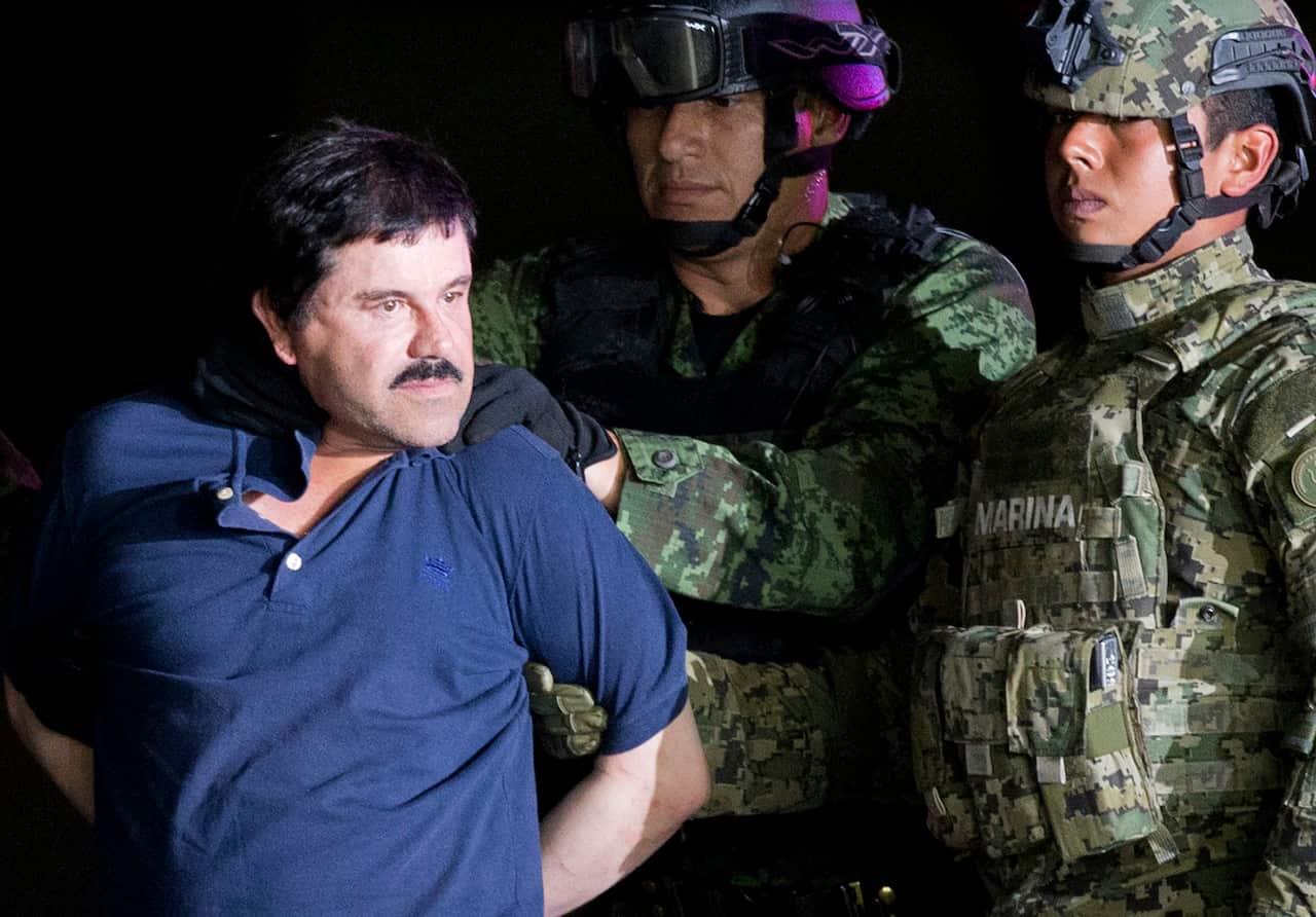 El Chapo under heavy guard by Mexican Marines.