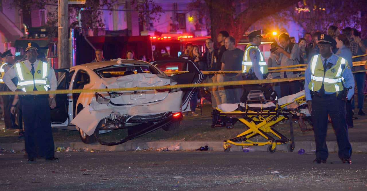 New Orleans Police and State Police respond to a scene where a vehicle crashed into a crowd of people injuring at least a dozen at Carrollton and Orleans Ave.