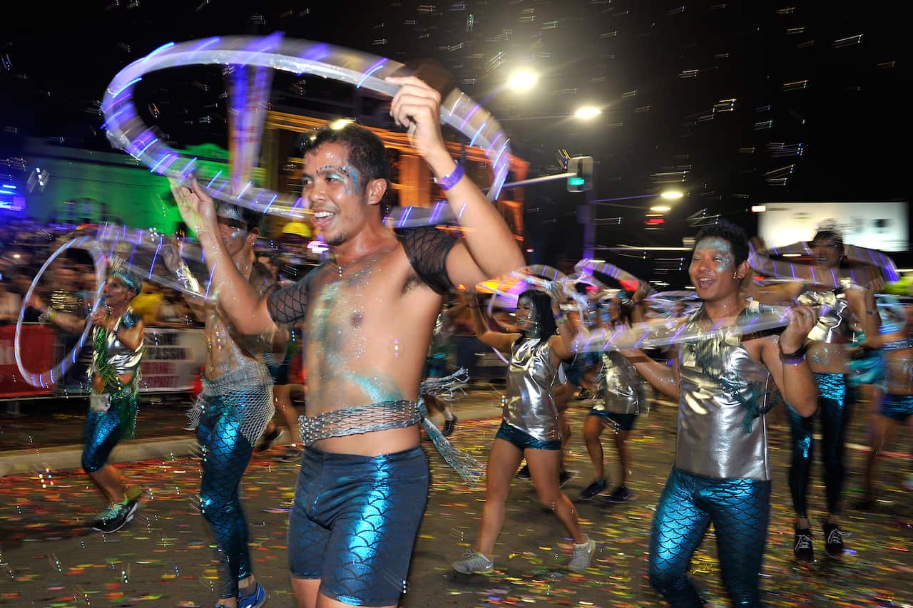 Participants are seen taking part in the 39th annual Gay and Lesbian Mardi Gras parade, in Sydney, Saturday, March 4, 2016. (AAP Image/Joel Carrett) NO ARCHIVING