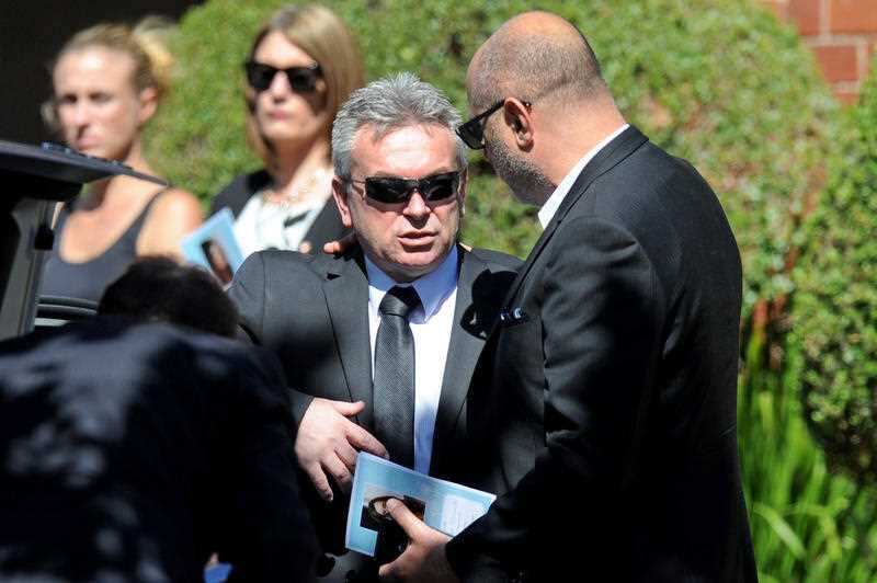 Borce Ristevski attends his wife's funeral in 2017.