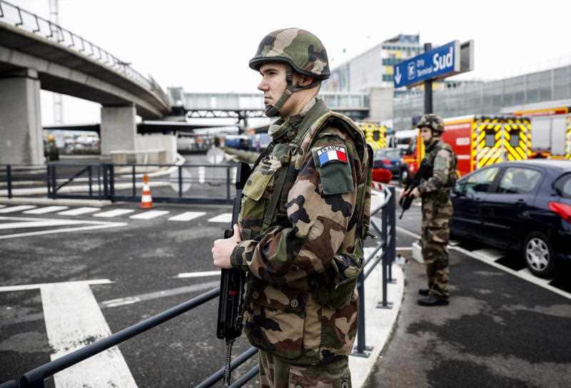 Soldiers patrol at Orly airport, south of Paris
