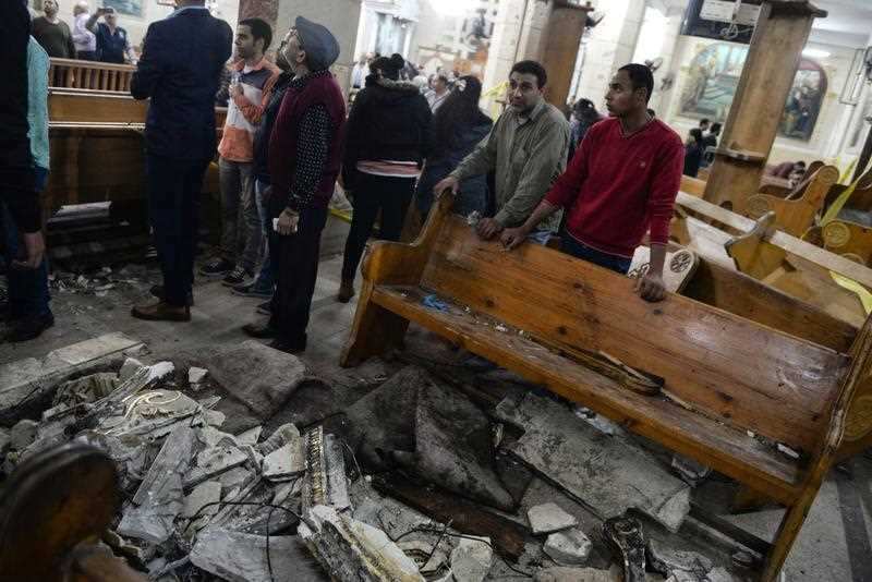 People gather to view the damages at the scene of a bomb explosion inside Mar Girgis church in Tanta, 90km north of Cairo, Egypt, 09 April 2017