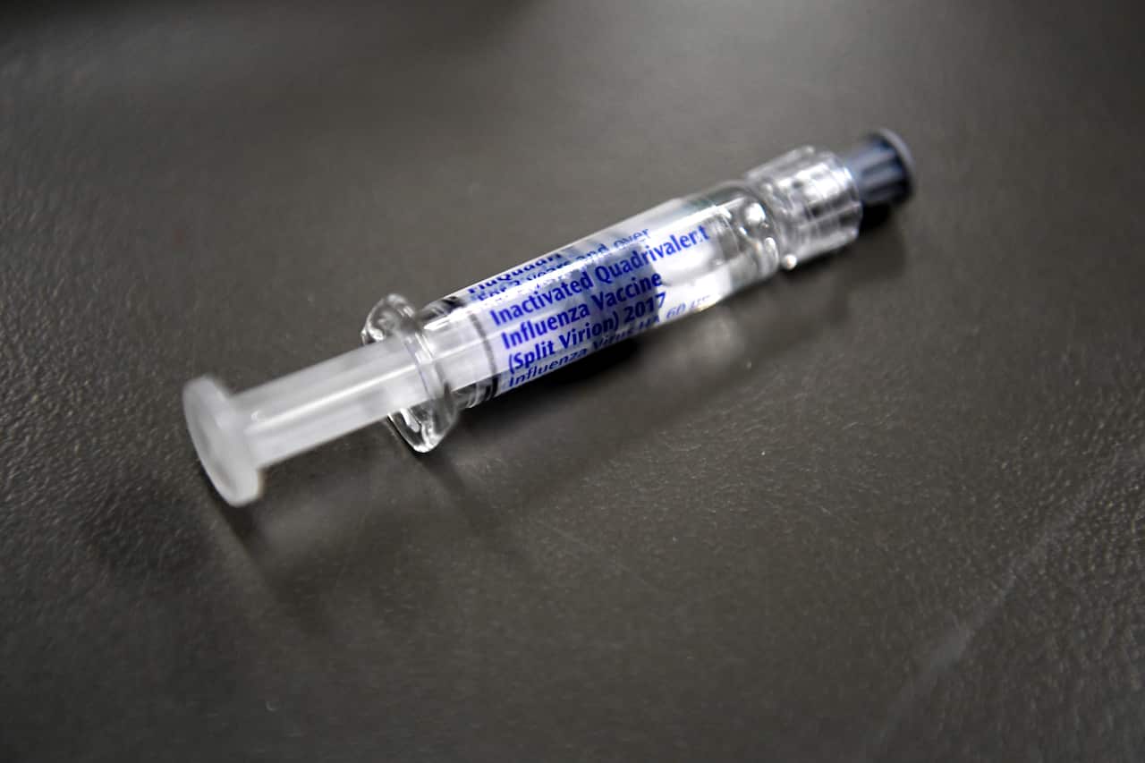 A  flu immunisation needle is seen as part of a work-provided Flu vaccination initiative in Rhodes, New South Wales, Australia, Monday, April 10, 2017.