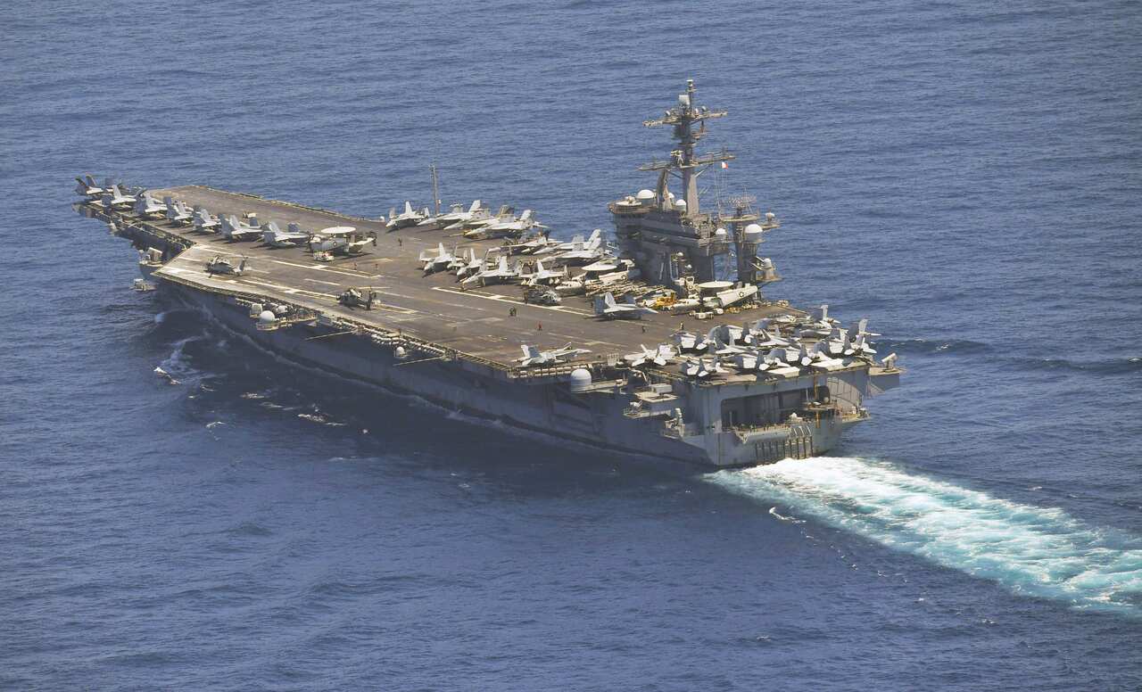 An aerial photo shows the nuclear-powered aircraft carrier U.S. Carl Vinson sailing  toward the north northeast in Tsushima Channel, offshore of Nagasaki Prefecture on April 29, 2017.