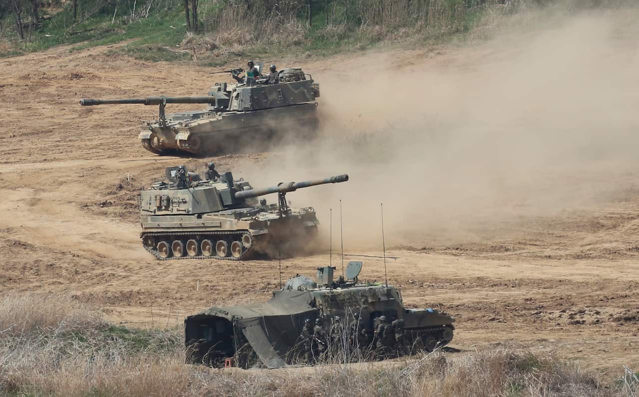 South Korean army K-9 self-propelled howitzers move during the annual exercise in Paju, South Korea, near the border with North Korea.