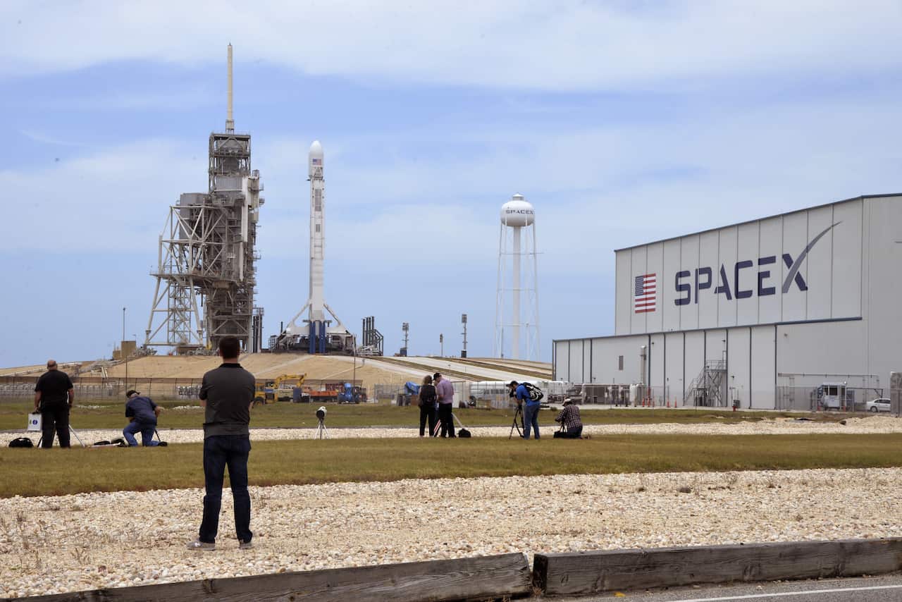 SpaceX stopped the launch of its Falcon 9 less than a minute before take off, citing an issue with one of the sensors.