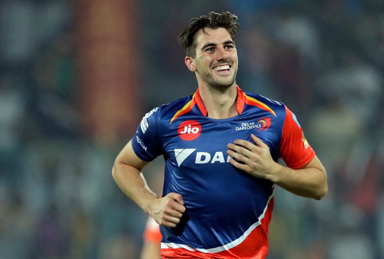 Delhi Daredevils' Pat Cummins celebrates the dismissal of Gujarat Lions' Dinesh Karthik during their Indian Premier League (IPL) cricket match in New Delhi, India, Thursday, May 4, 2017. (AP Photo/Tsering Topgyal)