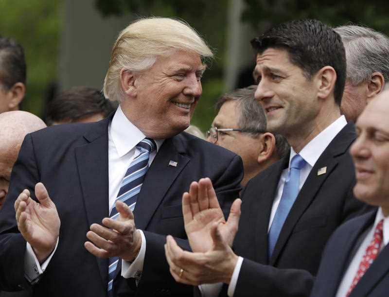 President Donald Trump talks with House Speaker Paul Ryan of Wis. in the Rose Garden of the White House in Washington, Thursday, May 4, 2017