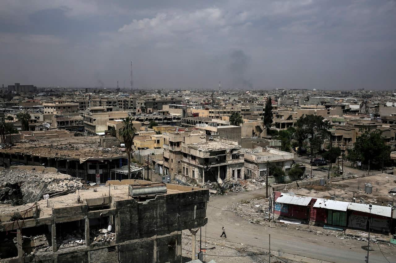 Destroyed buildings from fighting between Iraqi forces and the Islamic State group are seen in western Mosul, Friday, May 5, 2017.