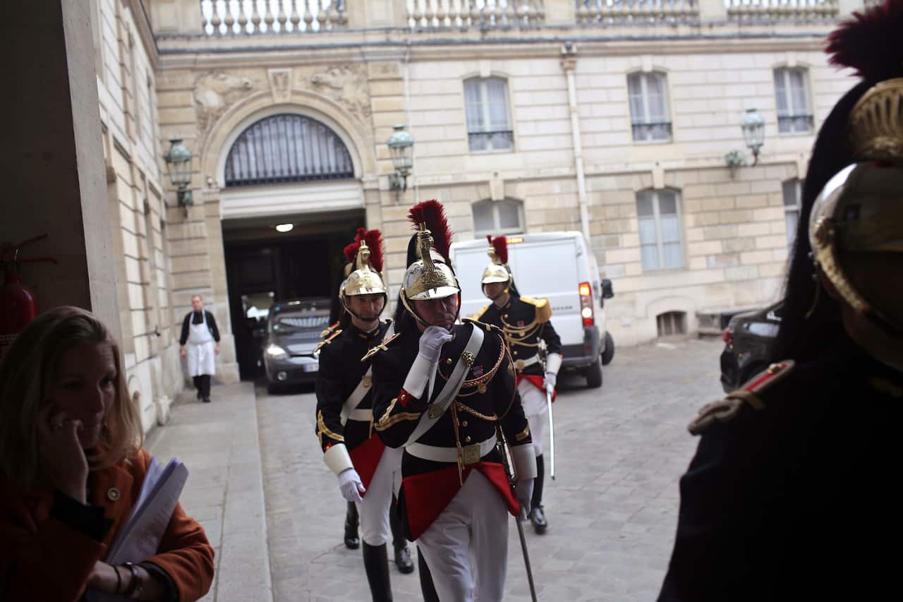 Republican guards arrive for Emmanuel Macron's formal inauguration ceremony as French President.