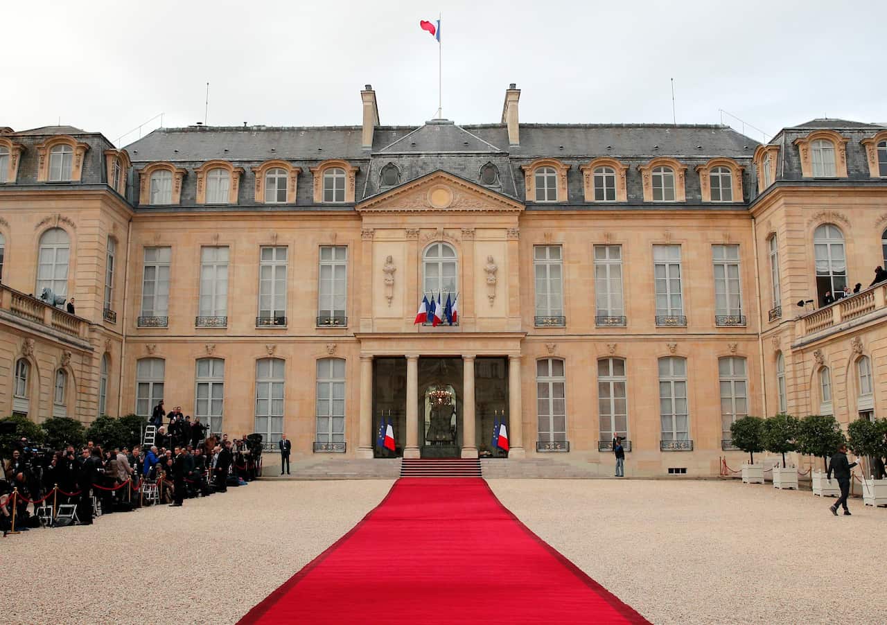 The red carpet is set up prior to the takeover ceremony between President Francois Hollande and President-elect Emmanuel Macron.