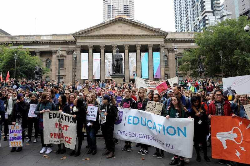 The National Student Union gather to protest at the State Library in Melbourne