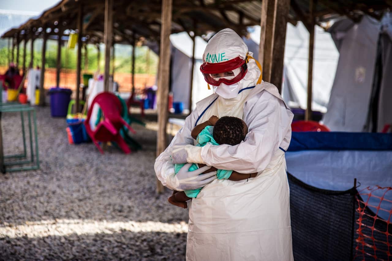 A supplied image obtained Wednesday, May 17. 2017 of Australian nurse Anne Carey caring for patients at a Red Cross Ebola treatment centre in Sierra Leone. 