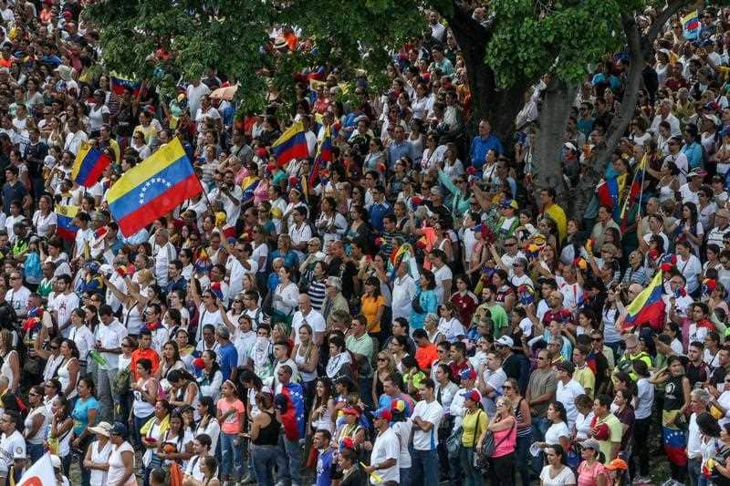 Thousands of people gather for an anti-government march in Caracas, Venezuela