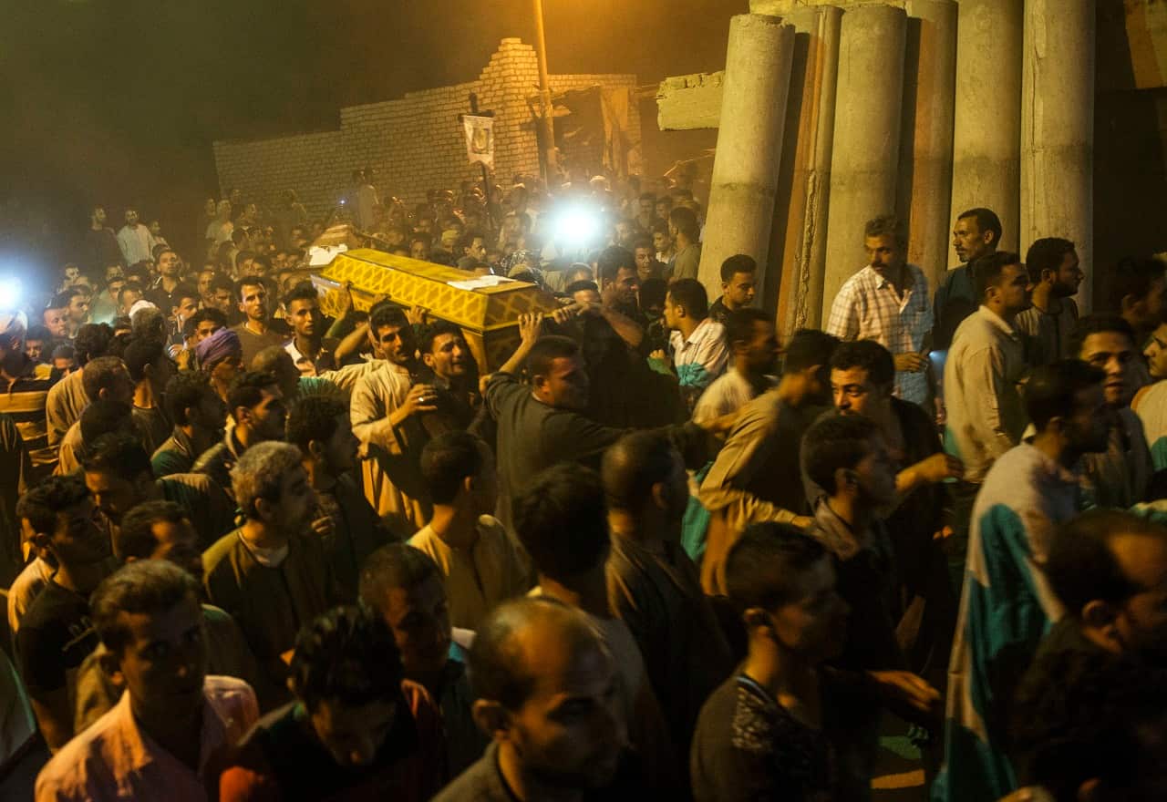 Mourners during the funeral of victims killed in an attack at the Monastery of St Samuel the Confessor, in Minya Province, central Egypt, 26 May 2017.