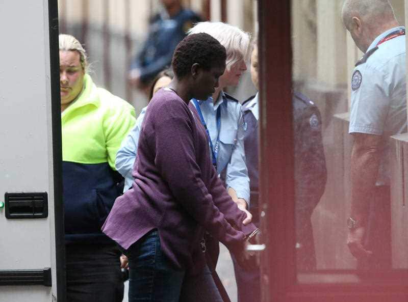 Akon Guode arrives in a prison van to the Supreme Court of Victoria in Melbourne, Tuesday, May 30, 2017.