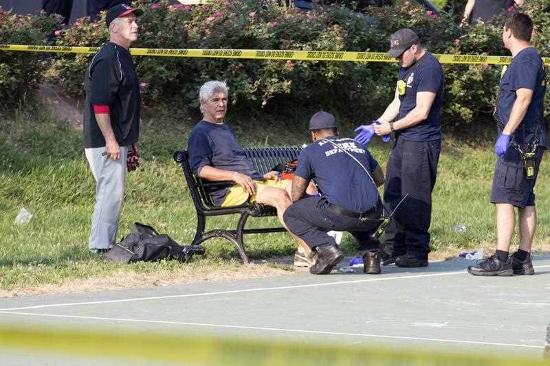 A man receives medical attention from first responders on the scene following a shooting in Alexandria, Virginia, USA, 14 June 2017. 