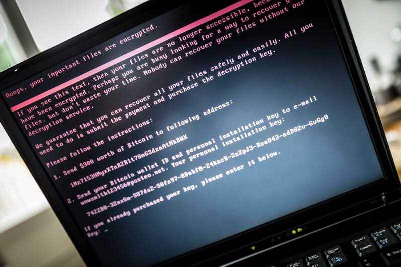  A laptop screen displays a message after it was infected with ransomware during a worldwide cyberattack, in Geldrop, Netherlands, 27 June 2017 