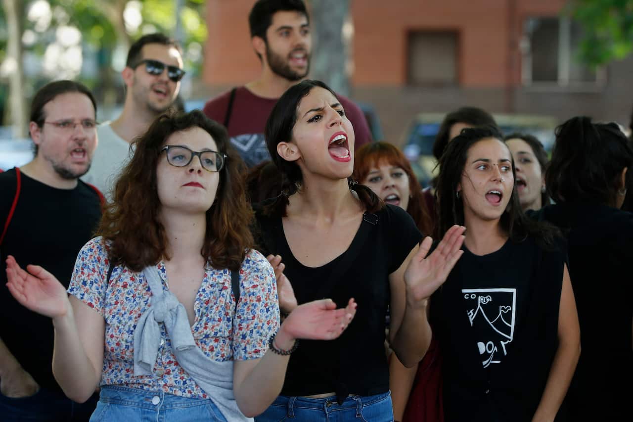 Protesters shout outside the entrance of the Caja Magica where the Mad Cool festival is taking place after a 'Green Day' concert was not suspended after the death of an acrobat