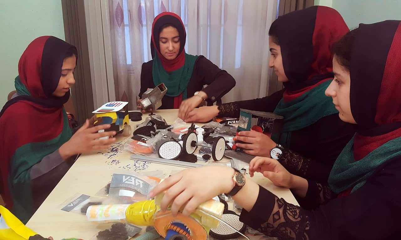 Teenage girls from Afghanistan Robotic House, a private training institute, practice at the Better Idea Organization center in Herat, Afghanistan.