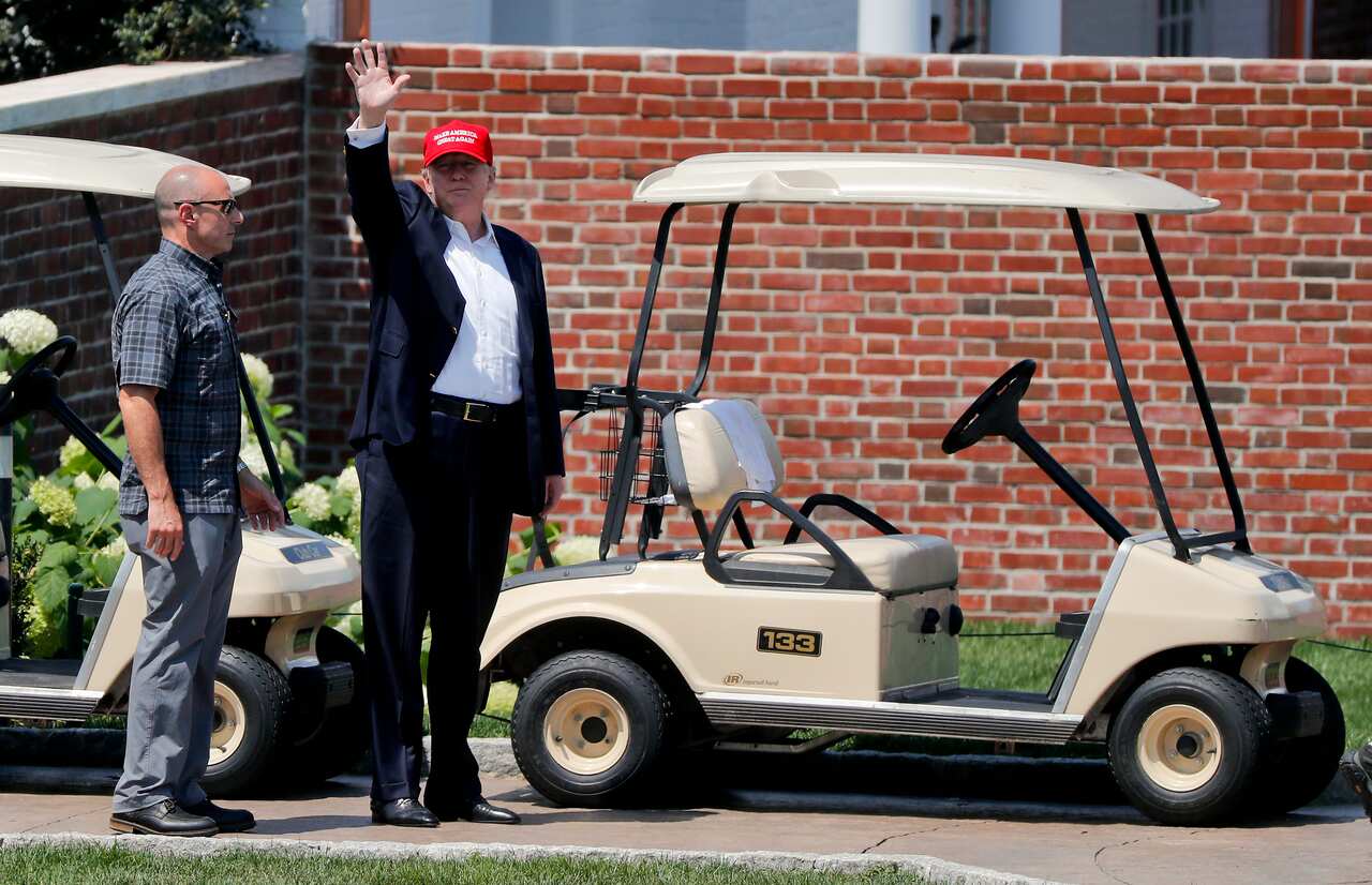 President Donald Trump walks out of his residence at the Trump National Golf Club in Bedminster, New Jersey.
