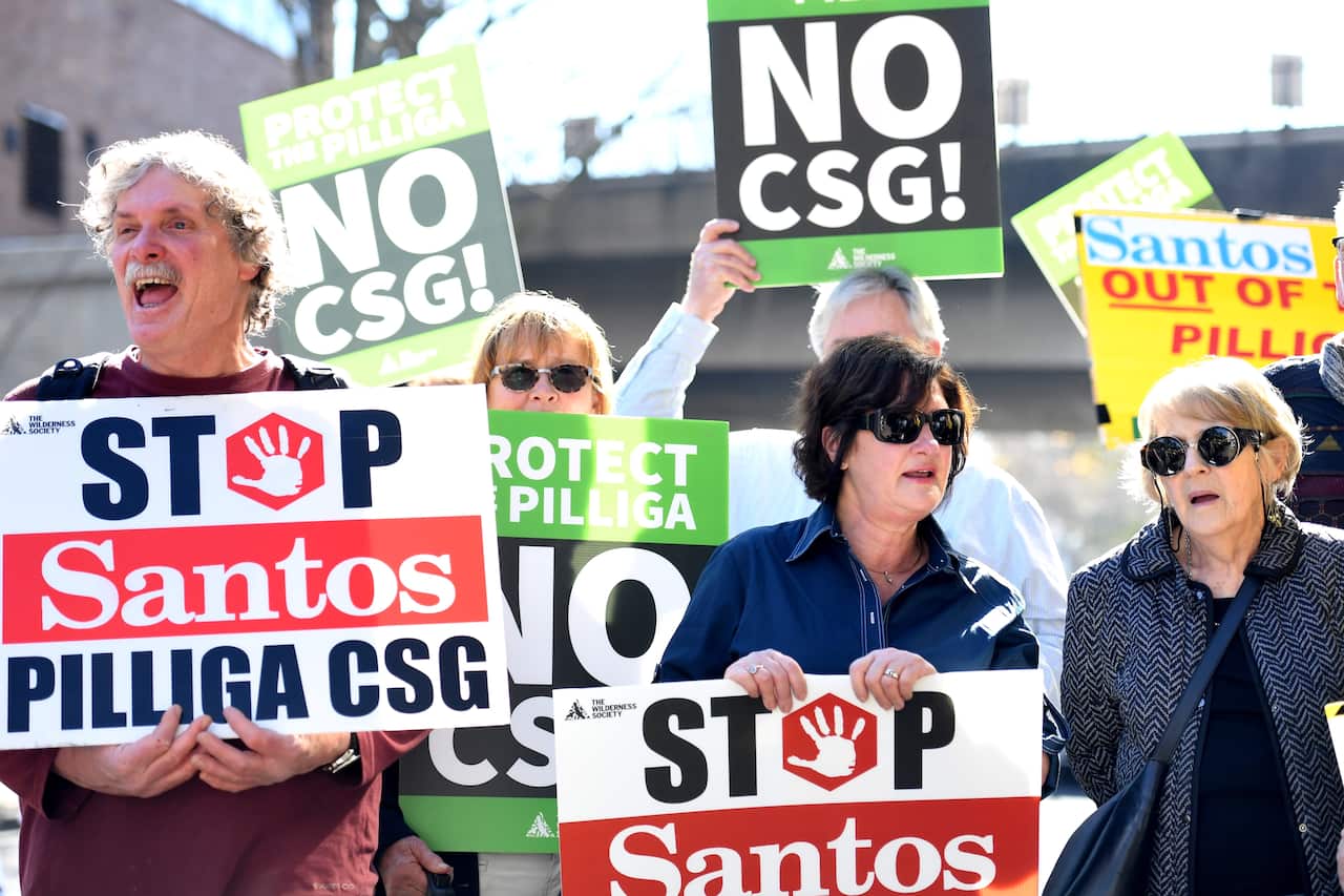 Demonstrators protest against Santos' plans for a major coal seam gas field near Narrabri, in Sydney in August, 2017. 