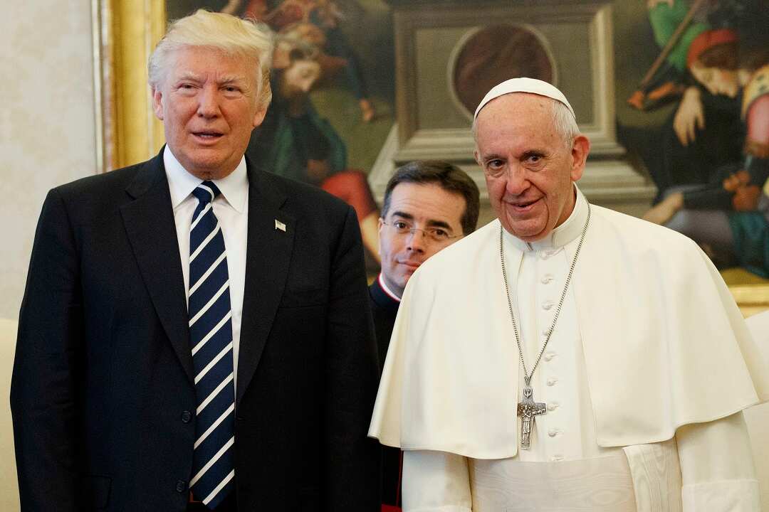 President Donald Trump stands with Pope Francis in 2017.
