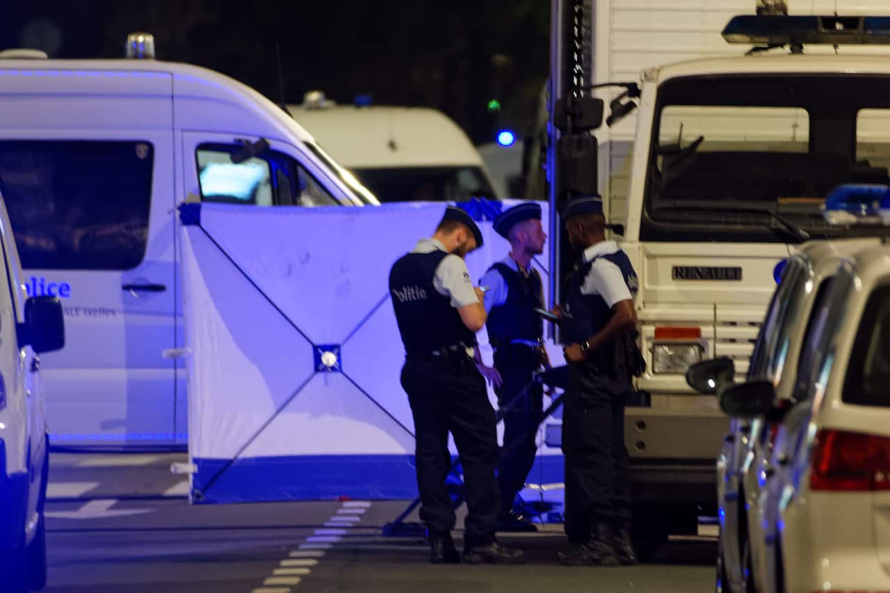A man has been shot in the centre of Brussels after attacking two soldiers with a knife.