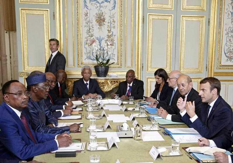 French President Emmanuel Macron, third left, chairs a meeting on migration across the Mediterranean Sea at the Elysee Palace in Paris