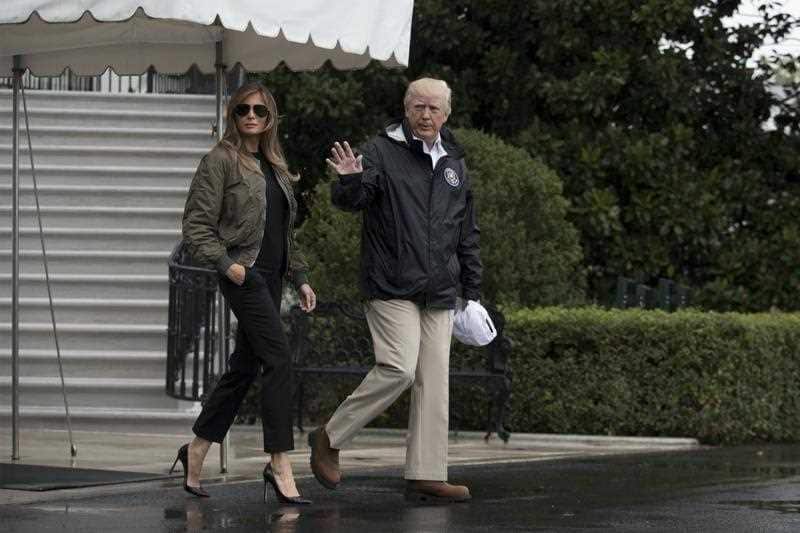 US President Donald J. Trump (R) and First Lady Melania Trump (L) walk out of the South Portico to depart the South Lawn of the White House by Marine One, in Washington, DC, USA, 29 August 2017. President Trump travels to Texas to inspect stor