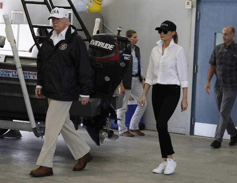 resident Donald Trump and first lady Melania Trump arrive take part in a briefing on Harvey relief efforts, Tuesday, Aug. 29, 2017, at Firehouse 5 in Corpus Christi, Texas. (AP Photo/Evan Vucci)