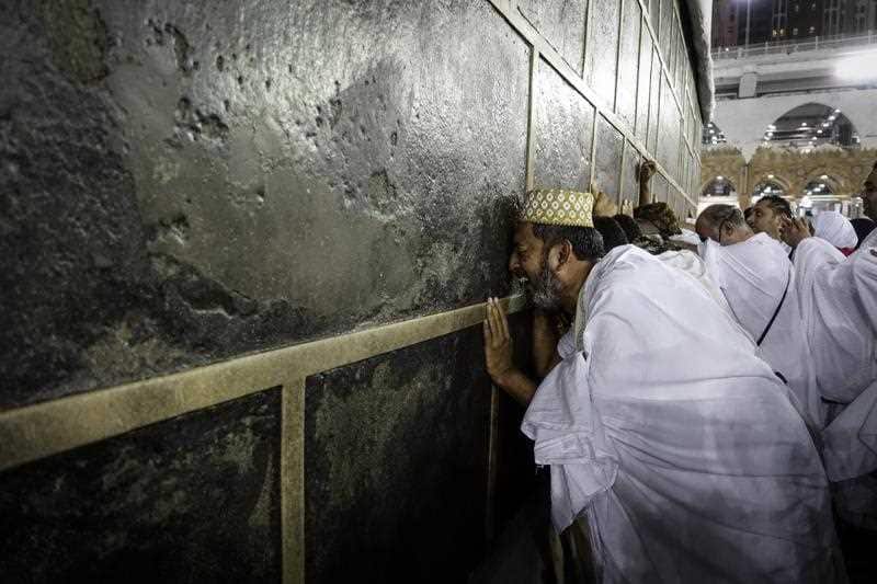 A Muslim worshipper cries as he kisses the holy Kaaba at the Grand Mosque in Mecca, Saudi Arabia, 29 August 2017.