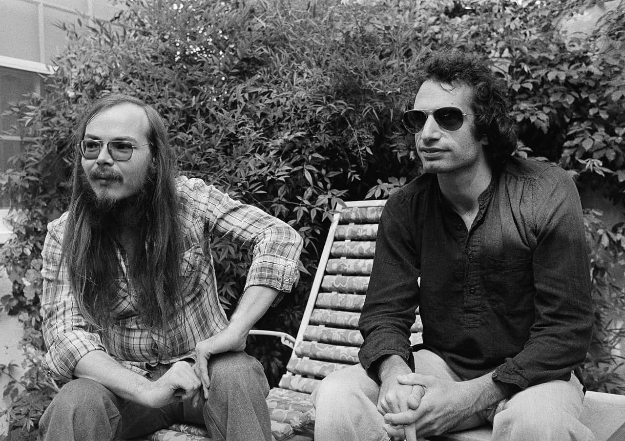Oct. 29, 1977, file photo, Walter Becker, left, and Donald Fagen of Steely Dan, sit in Los Angeles. 