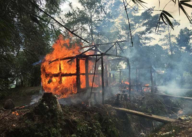 Houses are on fire in Gawdu Zara village, northern Rakhine state, Myanmar, Thursday, Sept. 7, 2017. 
