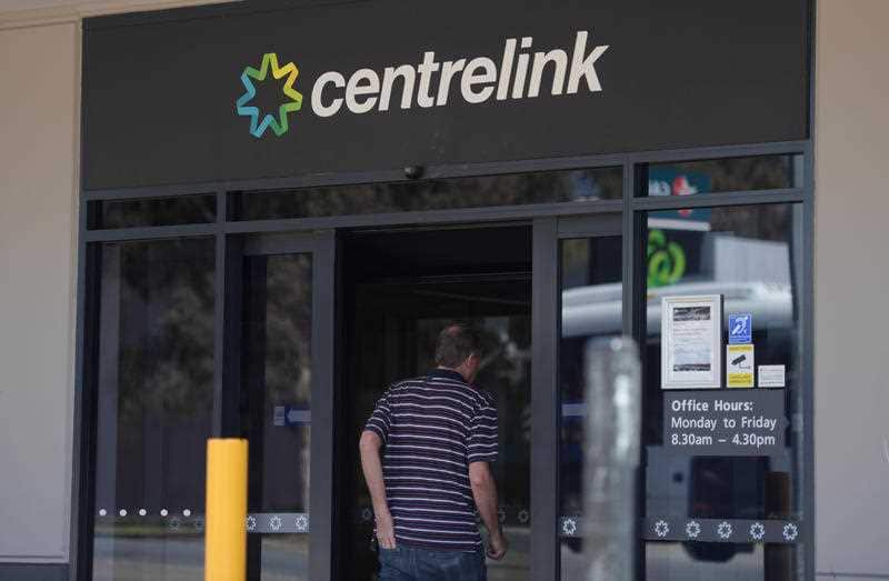A man walks into a Centrelink in Salisbury, north of Adelaide.