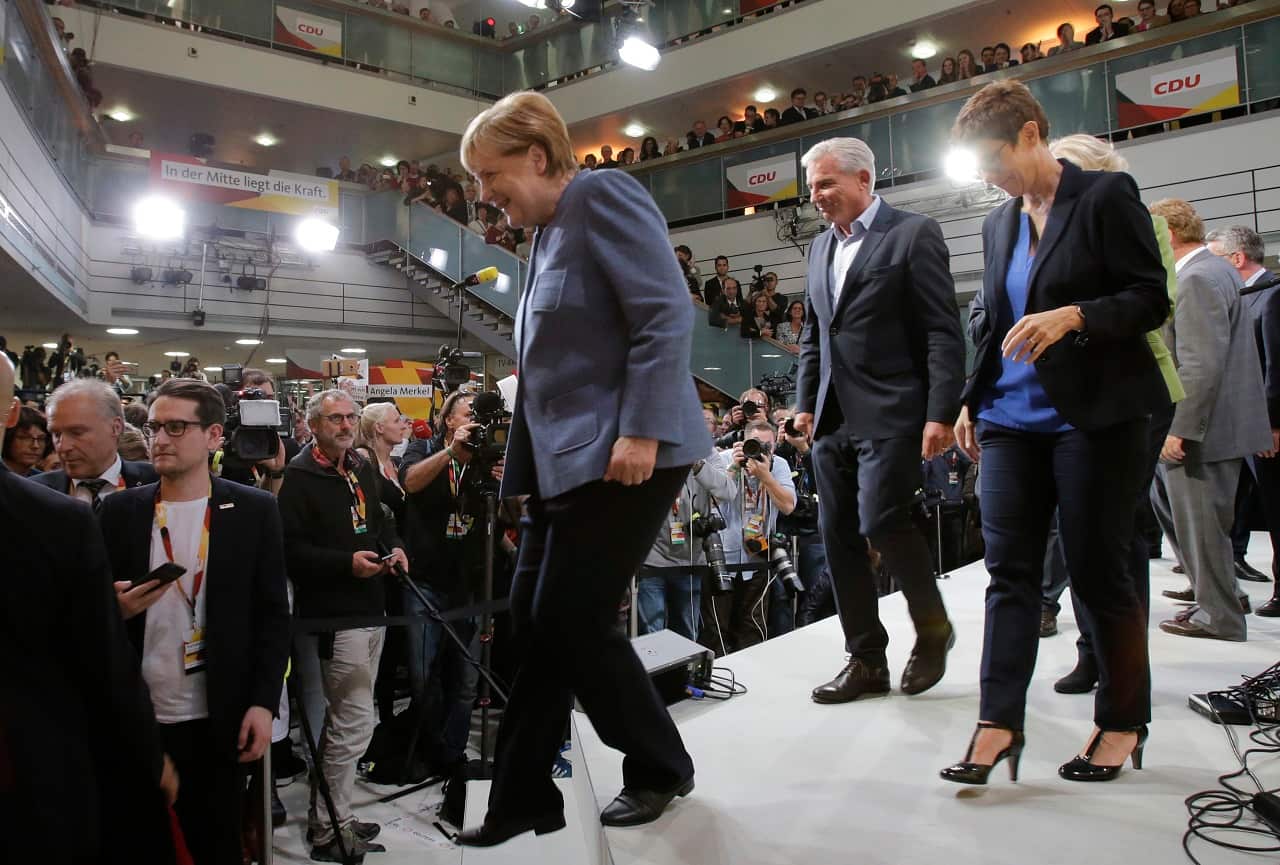 German Chancellor Angela Merkel leaves the stage at the headquarters of the Christian Democratic Union CDU in Berlin, Germany.