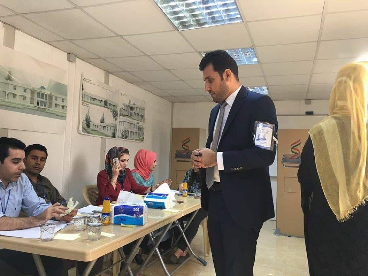 AA man casts his referendum vote at a polling station in the city of Erbil, the capital of the autonomous Kurdish region of northern Iraq.