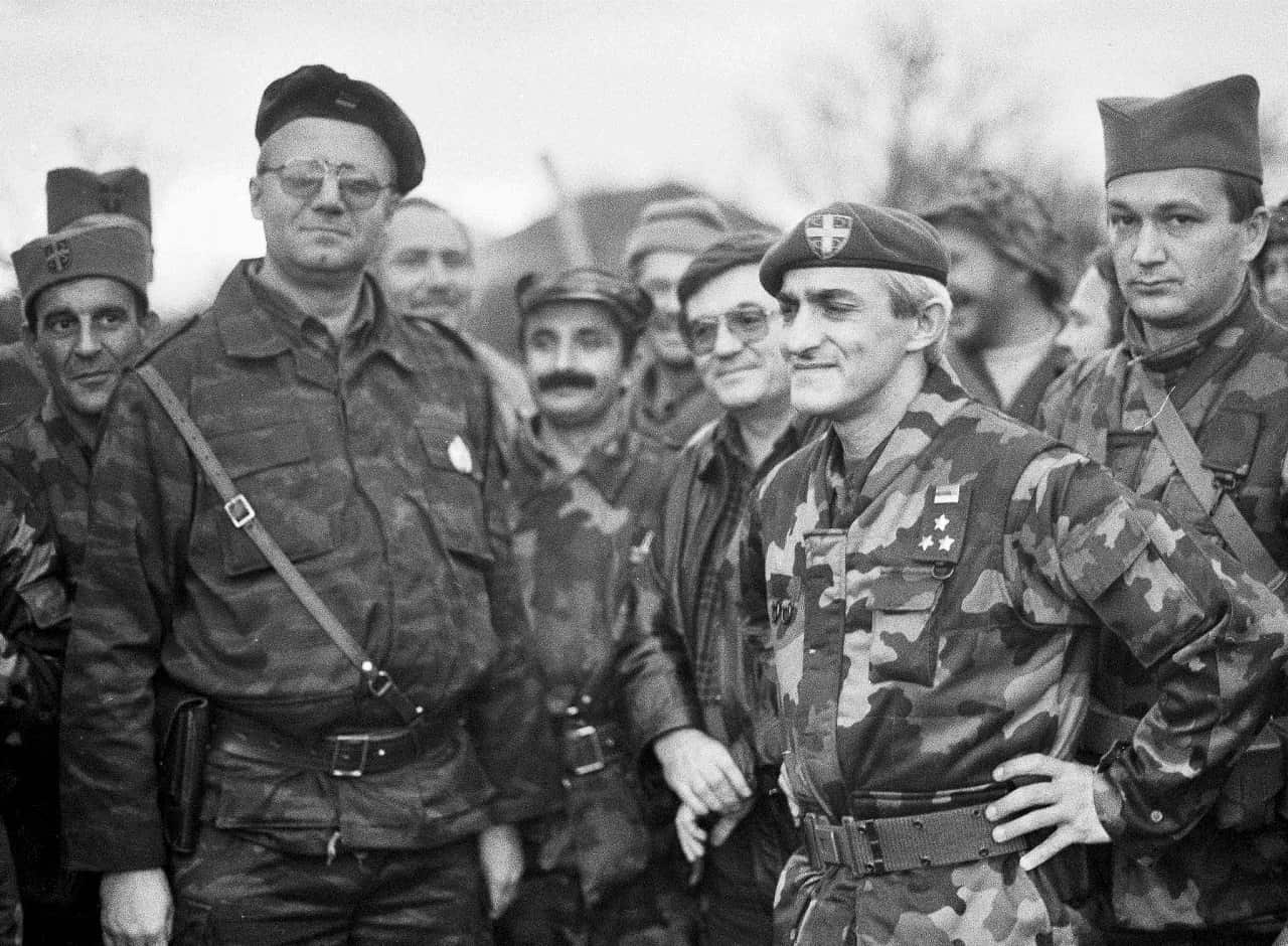 Dragan Vasiljkovi and the president of the ultra-national Serbian Radical Party Vojislav Seselj (2-L) at the battle field in Benkovac city in Croatia, in 1991.