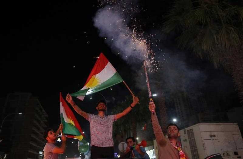 Kurds celebrate after the announcement of the results of the independence referendum in Erbil, Kurdistan region in northern Iraq, 26 September 2017.