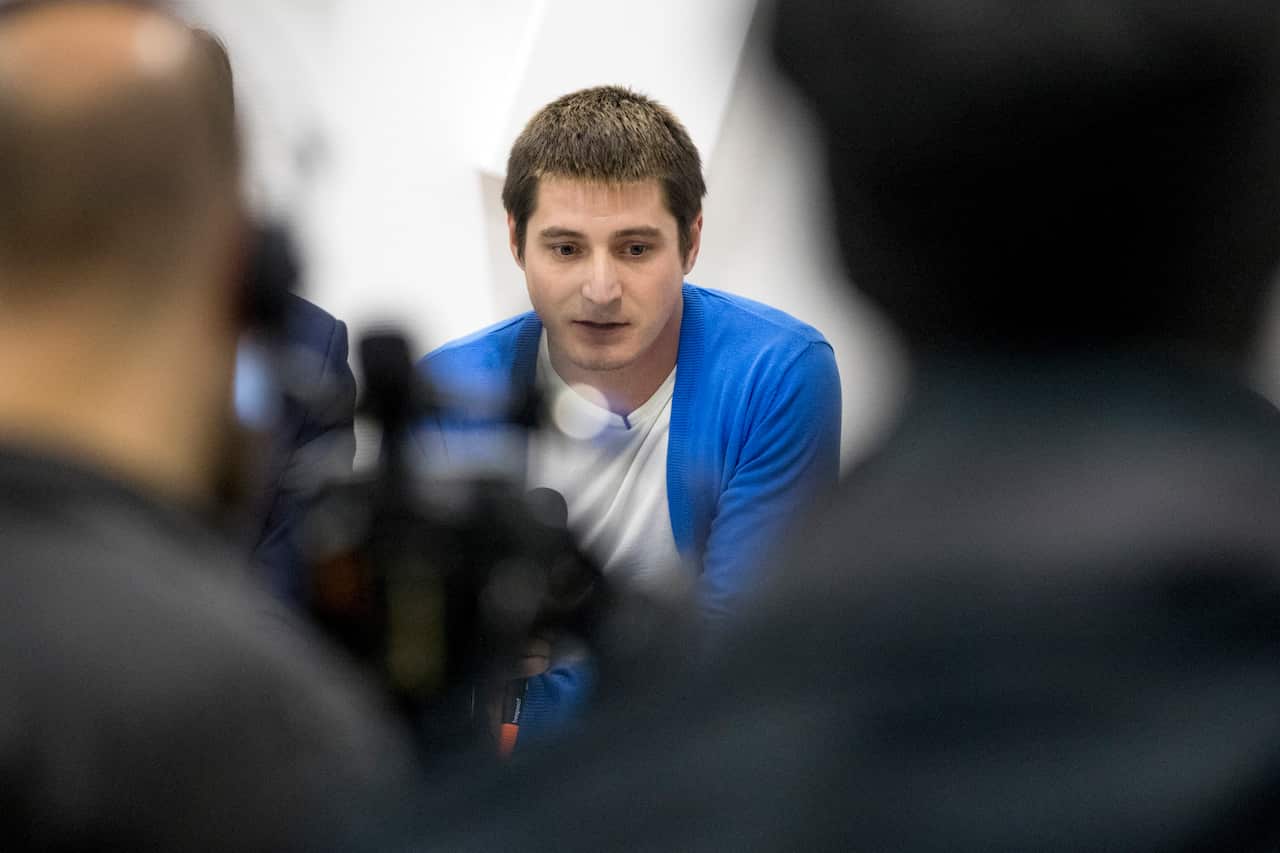 Maxim Lapunov, a Russian man who is accusing authorities in Chechnya of brutally beating him as part of a broad crackdown on gay people in the Russian Region, speaks during a press conference in Moscow, Russia, Monday, Oct. 16, 2017.