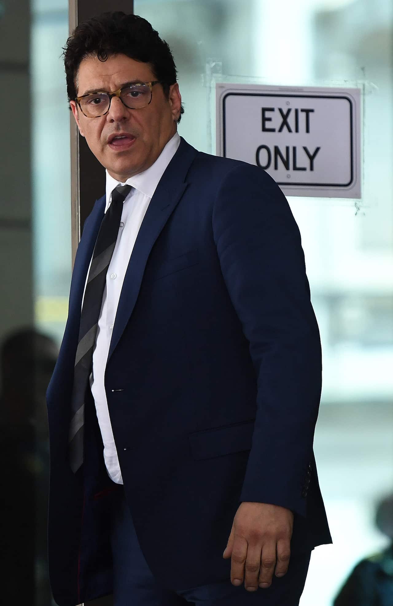 Australian actor Vince Colosimo leaves the Melbourne Magistrates Court in Melbourne.