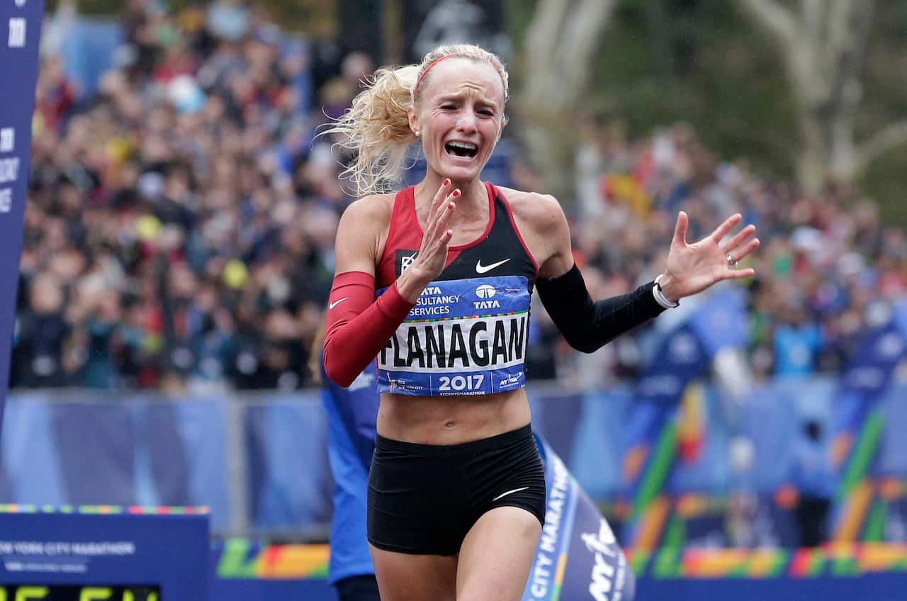 Shalane Flanagan of the United States crosses the finish line first in the women's division of the New York City Marathon in New York, Sunday, Nov. 5, 2017. (AP Photo/Seth Wenig)