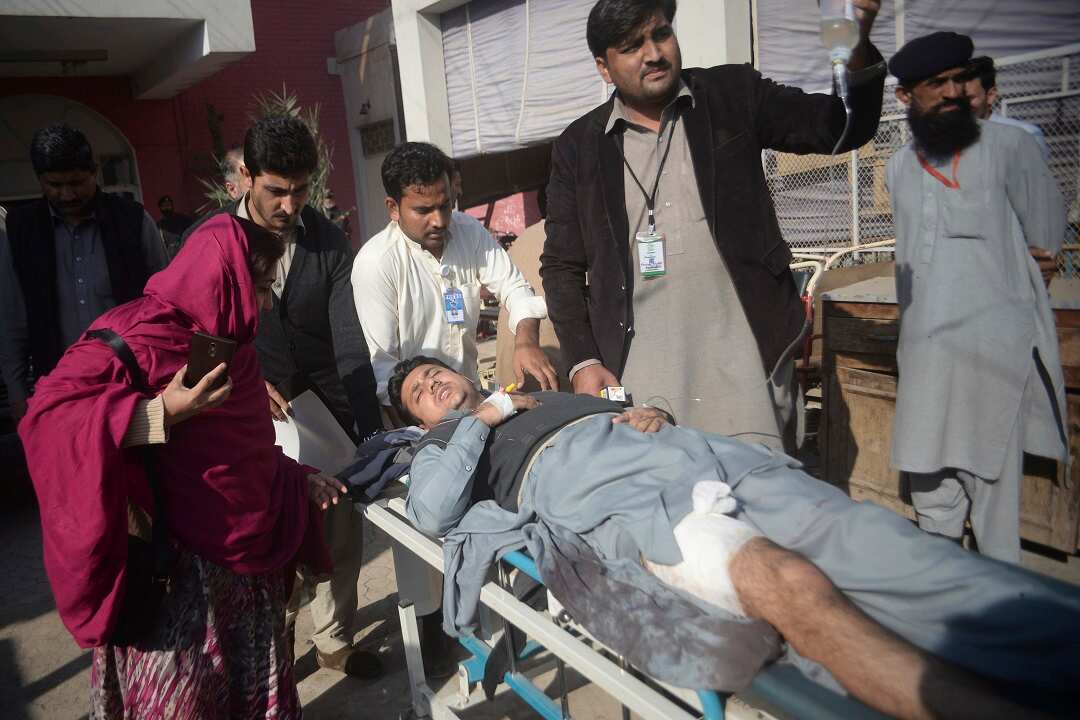 One of the wounded in a shooting where four burqa-clad militants opened fire on the agricultural institute in Peshawar, Pakistan on Friday, December 1, 2017.